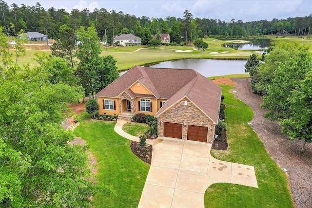139 Laurens Dr, Mccormick, SC 29835 - view of front of property with a water view, stone siding, driveway, a front lawn, and a garage