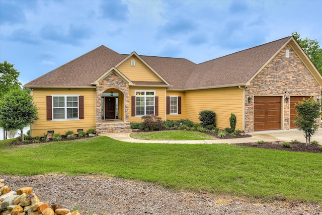139 Laurens Dr, Mccormick, SC 29835 - view of front of house with stone siding, a shingled roof, a garage, a front lawn, and driveway