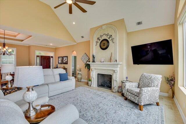 139 Laurens Dr, Mccormick, SC 29835 - tiled living area with a ceiling fan, arched walkways, a chandelier, a fireplace, and recessed lighting