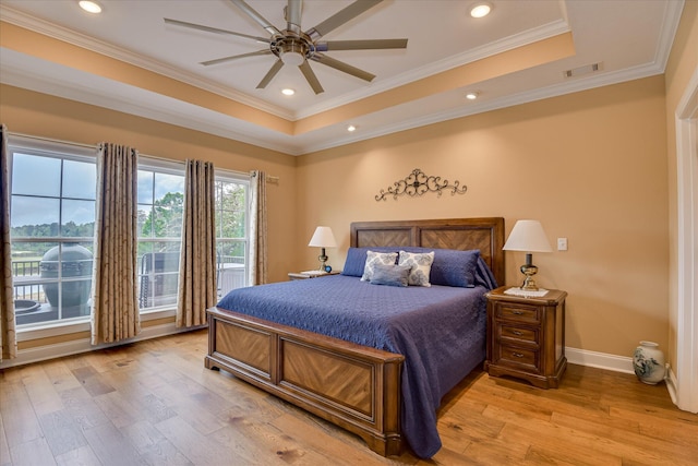 139 Laurens Dr, Mccormick, SC 29835 - bedroom featuring a raised ceiling, light wood-style flooring, ornamental molding, baseboards, and recessed lighting