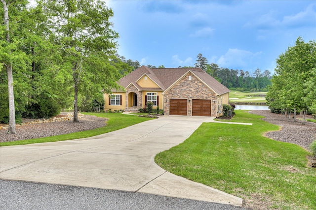 139 Laurens Dr, Mccormick, SC 29835 - craftsman inspired home featuring stone siding, concrete driveway, a garage, a front lawn, and a water view