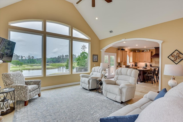 139 Laurens Dr, Mccormick, SC 29835 - living area featuring arched walkways, a ceiling fan, high vaulted ceiling, recessed lighting, and decorative columns