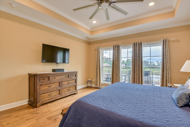 139 Laurens Dr, Mccormick, SC 29835 - bedroom featuring a tray ceiling, access to exterior, light wood-style flooring, ornamental molding, and baseboards