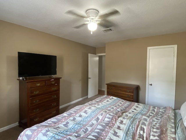 3406 Pine Hill Rd, Hephzibah, GA 30815 - carpeted bedroom with visible vents, baseboards, and ceiling fan