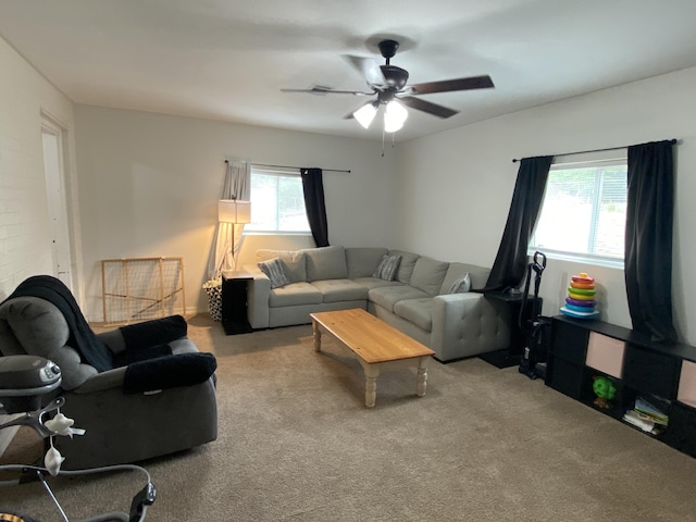 3406 Pine Hill Rd, Hephzibah, GA 30815 - living room featuring a ceiling fan and carpet flooring