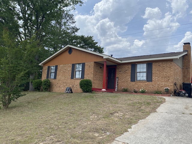 3406 Pine Hill Rd, Hephzibah, GA 30815 - ranch-style house featuring brick siding, a front lawn, aphalt driveway, and a chimney