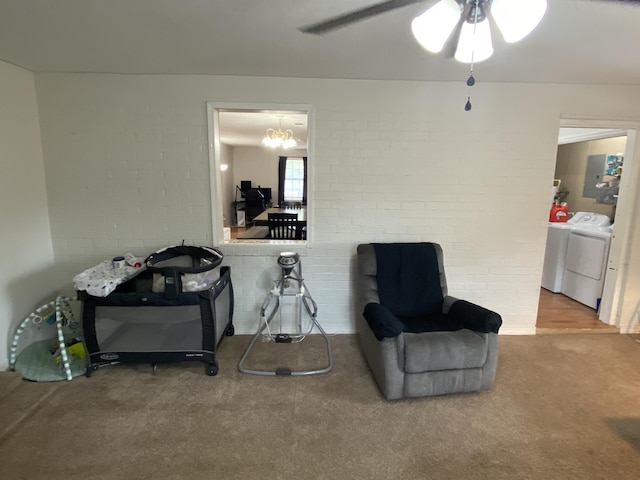 3406 Pine Hill Rd, Hephzibah, GA 30815 - sitting room with carpet floors, a ceiling fan, and washer and clothes dryer