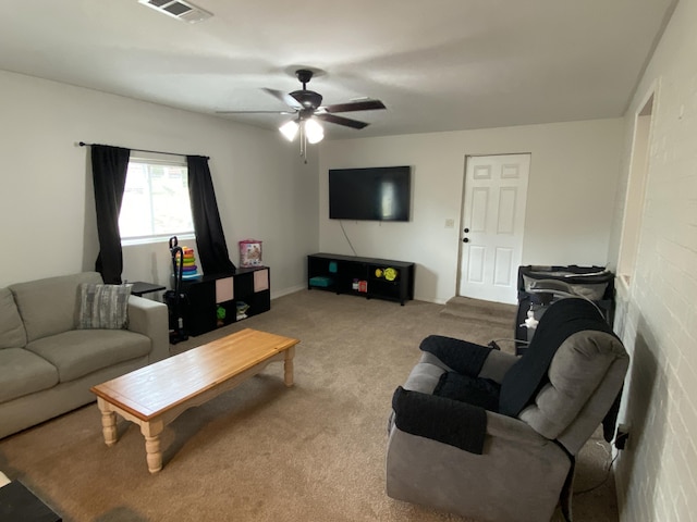 3406 Pine Hill Rd, Hephzibah, GA 30815 - living area with carpet floors, ceiling fan, and visible vents