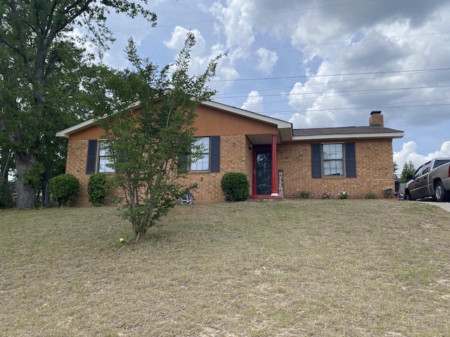 3406 Pine Hill Rd, Hephzibah, GA 30815 - single story home with brick siding, a chimney, and a front lawn