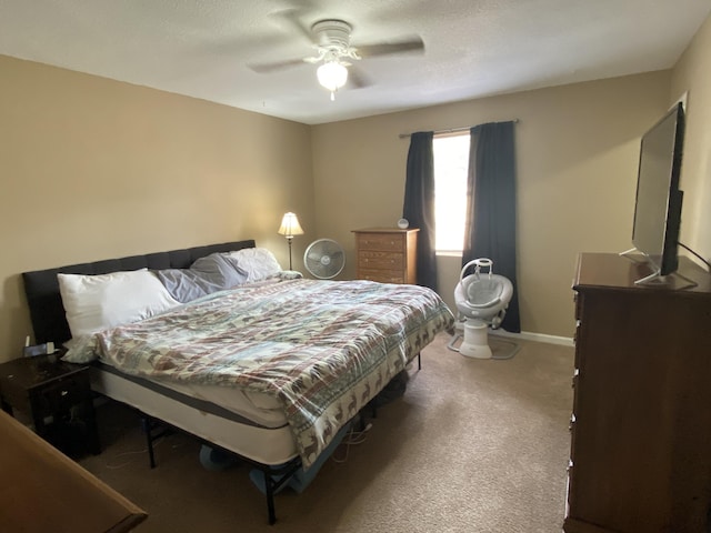3406 Pine Hill Rd, Hephzibah, GA 30815 - carpeted bedroom with baseboards and a ceiling fan