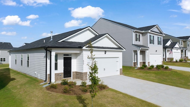 view of front facade featuring driveway, a front lawn, and board and batten siding