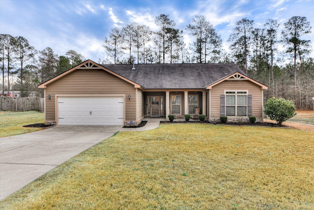 ranch-style house with a garage and a front yard