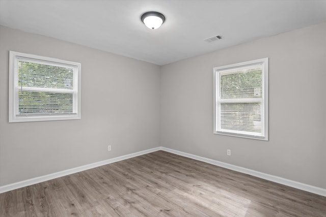 3589 Jonathan Cir, Augusta, GA 30906 - empty room featuring healthy amount of natural light and wood finished floors