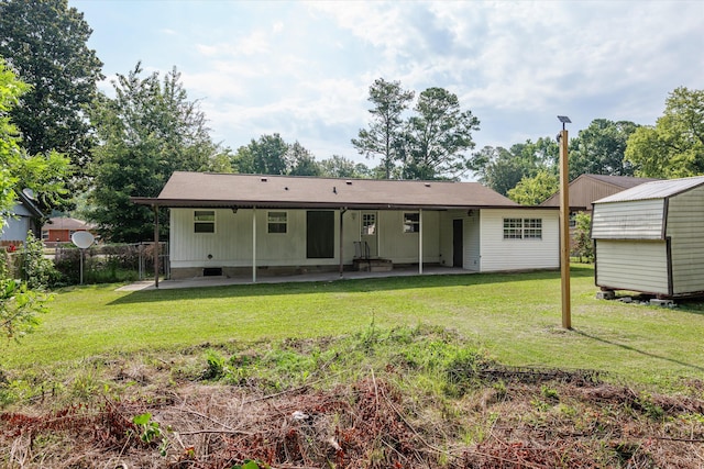 3589 Jonathan Cir, Augusta, GA 30906 - rear view of property with a patio area and a storage unit