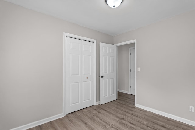 3589 Jonathan Cir, Augusta, GA 30906 - unfurnished bedroom with wood finished floors and a closet