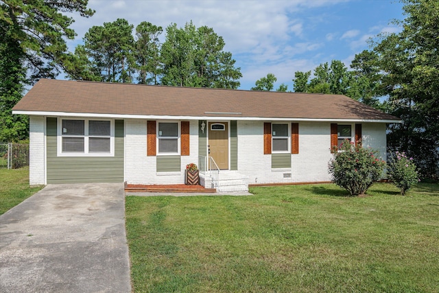 3589 Jonathan Cir, Augusta, GA 30906 - ranch-style house featuring brick siding, concrete driveway, and a front yard