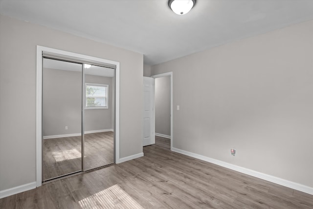 3589 Jonathan Cir, Augusta, GA 30906 - unfurnished bedroom with wood finished floors and a closet