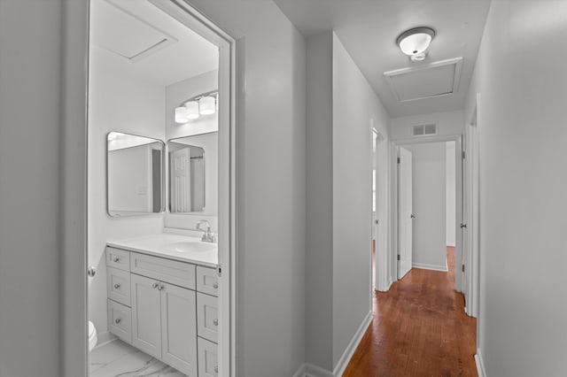 4004 Columbia Rd, Martinez, GA 30907 - corridor with a sink, baseboards, and attic access