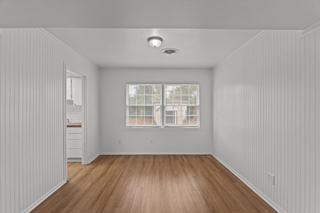 4004 Columbia Rd, Martinez, GA 30907 - empty room with wood finished floors, ornamental molding, and baseboards