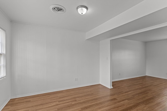 4004 Columbia Rd, Martinez, GA 30907 - empty room with wood finished floors, baseboards, and crown molding