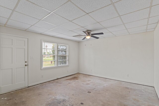 4004 Columbia Rd, Martinez, GA 30907 - unfurnished room with concrete flooring, a drop ceiling, a ceiling fan, and baseboards