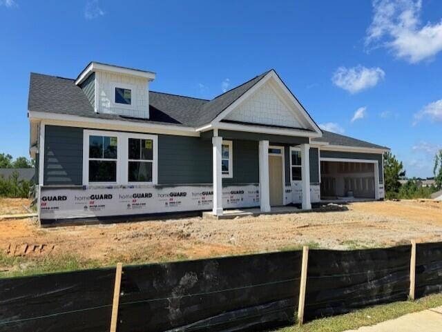 2198 Sinclair Dr Unit Sc108, Grovetown, GA 30813 - property in mid-construction featuring an attached garage, a porch, and dirt driveway