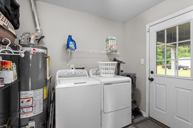 106 Allie Rd, Wrens, GA 30477 - washroom featuring water heater and separate washer and dryer