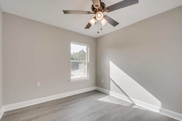 empty room featuring light hardwood / wood-style floors and ceiling fan