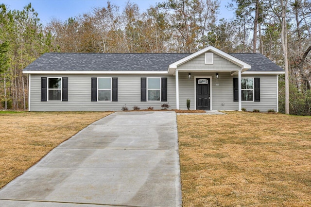 ranch-style house with a front yard