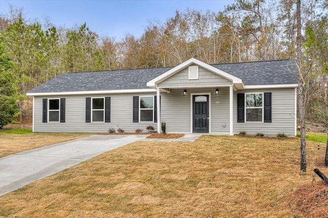 ranch-style house with a front yard