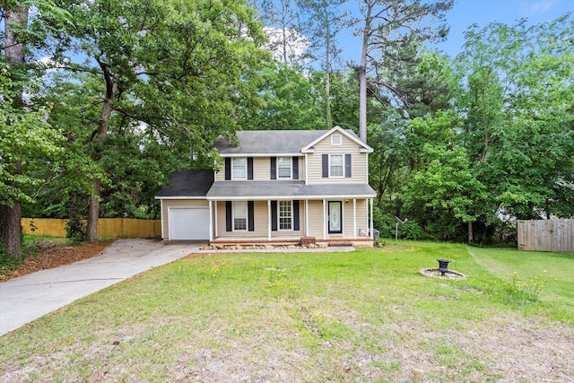 3701 Winchester Way, Martinez, GA 30907 - view of front of home with a porch, fence, an attached garage, driveway, and a front yard