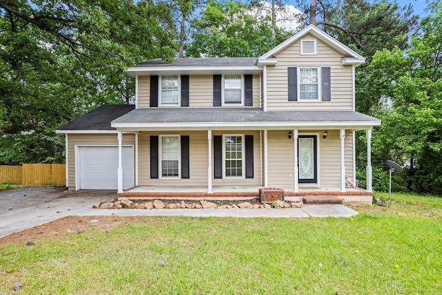 3701 Winchester Way, Martinez, GA 30907 - traditional home featuring a porch, fence, an attached garage, driveway, and a front lawn