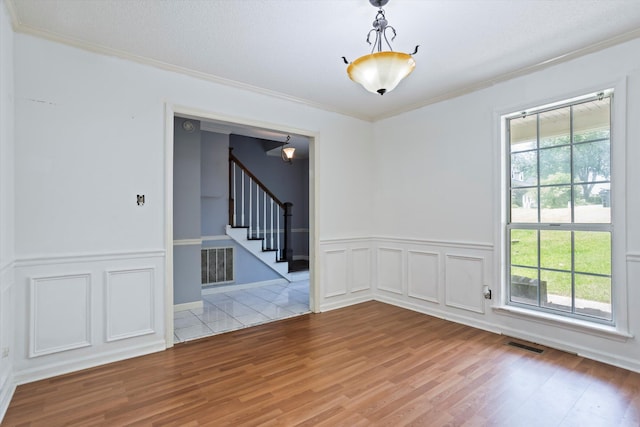 3701 Winchester Way, Martinez, GA 30907 - spare room featuring crown molding, stairs, visible vents, and wood finished floors