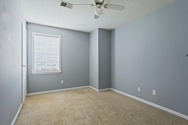 3701 Winchester Way, Martinez, GA 30907 - spare room featuring a textured ceiling, visible vents, ceiling fan, carpet floors, and baseboards