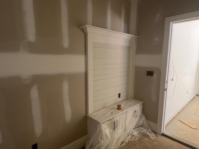 interior space featuring baseboards