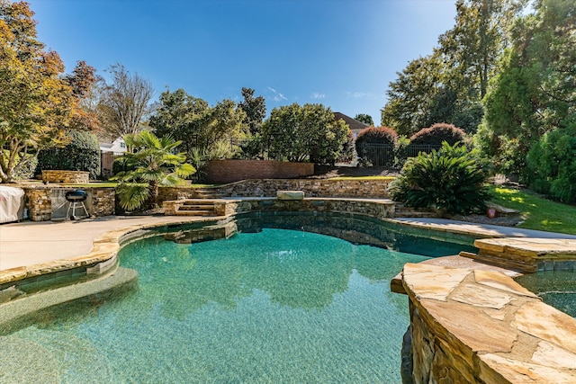 view of swimming pool featuring a patio