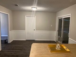 interior space featuring dark hardwood / wood-style flooring