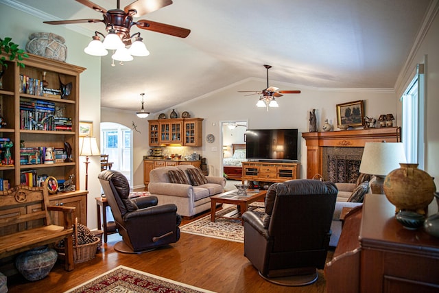 6287 Rousseau Creek Rd, Thomson, GA 30824 - living room featuring ceiling fan, dark wood-style floors, crown molding, a fireplace, and vaulted ceiling