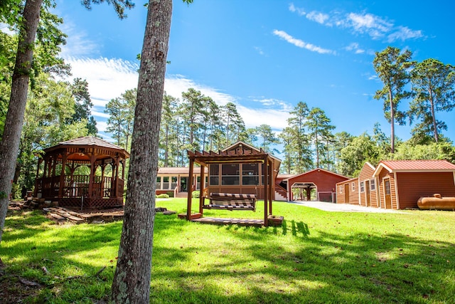 6287 Rousseau Creek Rd, Thomson, GA 30824 - view of green lawn with a gazebo and an outbuilding