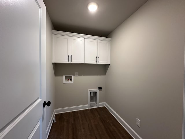 2417 Laurens St, Grovetown, GA 30813 - laundry room with washer hookup, dark wood-style flooring, cabinet space, baseboards, and hookup for an electric dryer