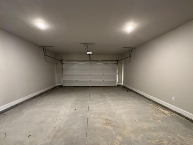 2417 Laurens St, Grovetown, GA 30813 - garage with baseboards and a garage door opener