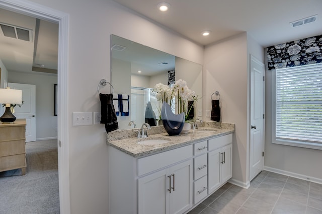 2027 Saylor Ln, Grovetown, GA 30813 - bathroom with double vanity, a shower stall, and tile patterned floors
