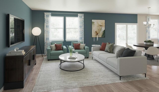 2027 Saylor Ln, Grovetown, GA 30813 - living room with a chandelier and wood finished floors