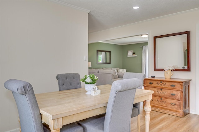 4073 Old Trail Rd, Augusta, GA 30907 - dining area with crown molding, wood finished floors, and recessed lighting