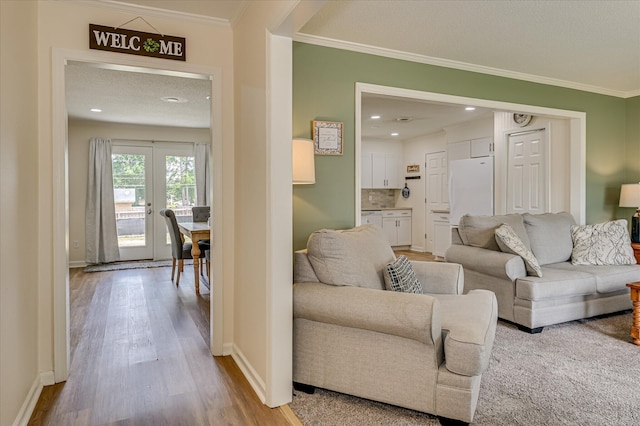 4073 Old Trail Rd, Augusta, GA 30907 - living area with crown molding, wood finished floors, and recessed lighting