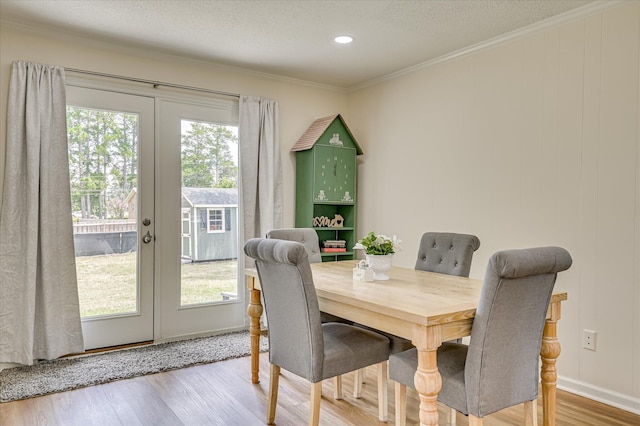 4073 Old Trail Rd, Augusta, GA 30907 - dining space with wood finished floors, ornamental molding, french doors, and recessed lighting
