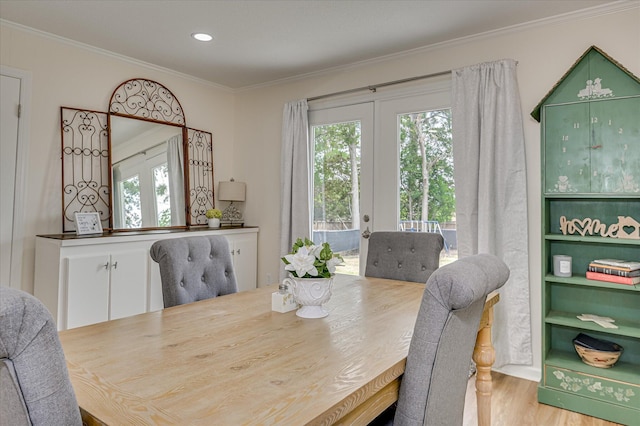 4073 Old Trail Rd, Augusta, GA 30907 - dining room featuring french doors, healthy amount of natural light, ornamental molding, wood finished floors, and recessed lighting