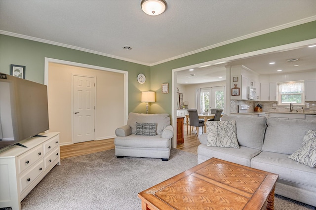 4073 Old Trail Rd, Augusta, GA 30907 - living room featuring crown molding, recessed lighting, and light carpet