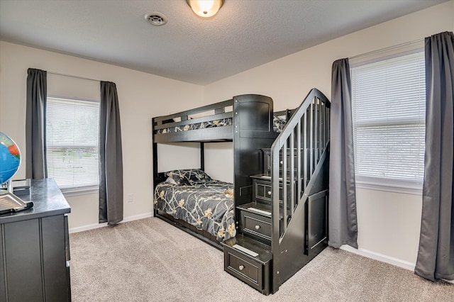 4073 Old Trail Rd, Augusta, GA 30907 - carpeted bedroom featuring multiple windows