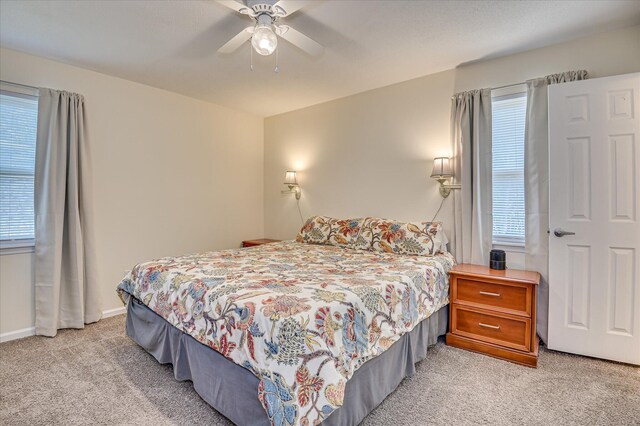 4073 Old Trail Rd, Augusta, GA 30907 - bedroom with light carpet, multiple windows, and ceiling fan